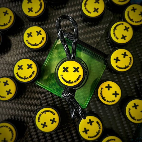 Dangerous Goods® PVC Yellow Smiley Knife Bead / Zipper Pull